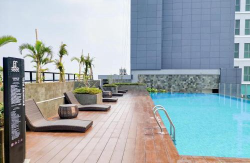 Pondok Aren Apartment | Comfort and Minimalist Studio at Embarcadero Bintaro Apartment By Travelio