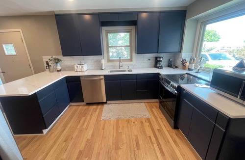 South Central Omaha House | Comfort & Space: 5BR Family Getaway w/Pool, Fire Table, and game room!