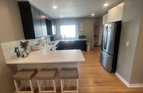 South Central Omaha House | Comfort & Space: 5BR Family Getaway w/Pool, Fire Table, and game room!