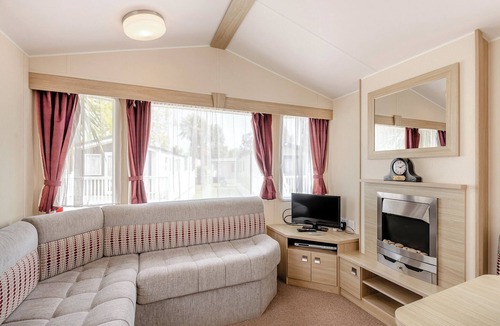 Westmarsh House | Comfortable 10ft wide caravan with one double and one twin.