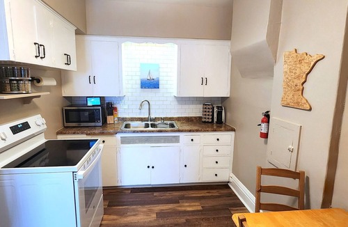 East Hillside Apartment | Comfortable 2BR Near Lakewalk with Private Entry & Parking