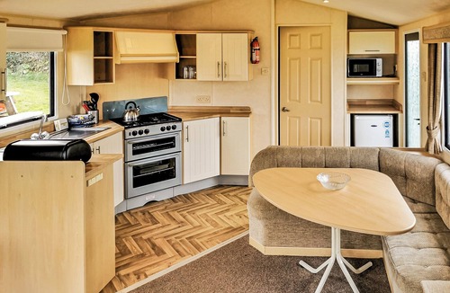 Perranporth House | Comfortable and spacious 12ft-wide caravan with one double and one twin.