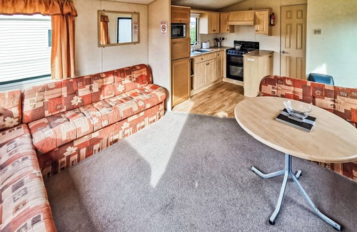Perranporth House | Comfortable and spacious 12ft-wide caravan with one double and one twin.