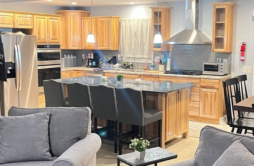 Gilford House | Comfortable and Spacious Home: Entertainment room, Gym + large deck and patio