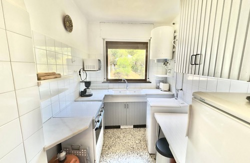 Almadraba-Canyelles Apartment | Comfortable apartment 140m from the beach with air conditioning and terrace