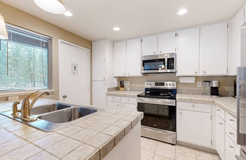 Tennis Village Condo | Comfortable condo w/shared pool, SHARC passes, trails, and more!