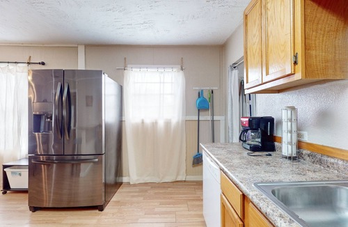 Ingleside House | Comfortable home with spacious living room, kitchen & dining area