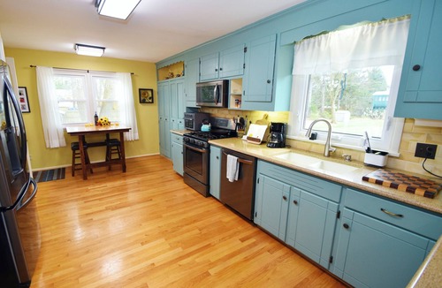 Penfield House | Comfortable Rochester Area Retreat Heated Pool, Hot Tub, 2 Kings & Fenced Yard