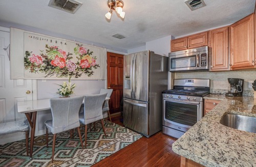 D Street - West Broadway Condo | Comfortable room with skylight in Southie