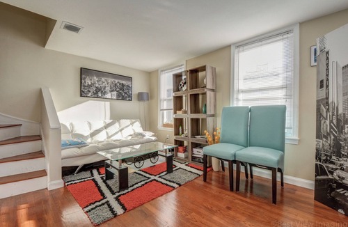 D Street - West Broadway Condo | Comfortable room with skylight in Southie