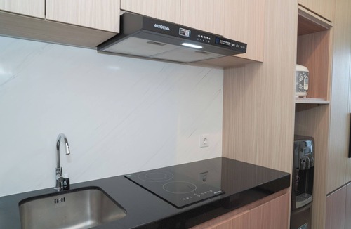 Semanggi Apartment | Comfy White Studio At Ciputra World 2 Apartment