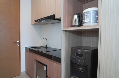 Semanggi Apartment | Comfy White Studio At Ciputra World 2 Apartment