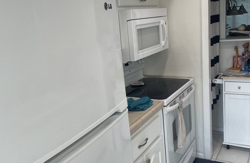 Bay Isles Condo | Condo- steps to the sand