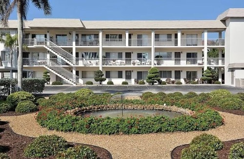Bay Isles Condo | Condo- steps to the sand