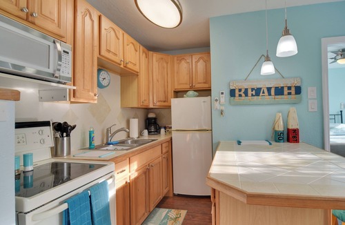 Madeira Beach Apartment | Condo w/Community Pool - Walk to Madeira Beach!