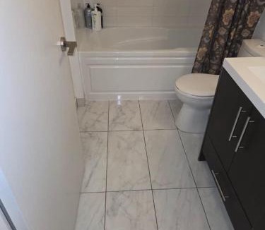 Port Hope Apartment | Condo with grey sofa bed