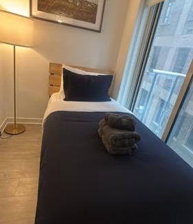Port Hope Apartment | Condo with grey sofa bed