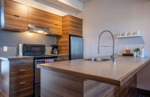 Lac Superieur Village Apartment | Condos overlooking Lac Superieur & mountain views