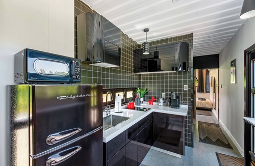 Littleton House | Container Home with Mountain Views Deck Fire Pit