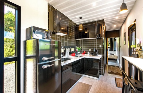 Littleton House | Container Home with Mountain Views Deck Fire Pit