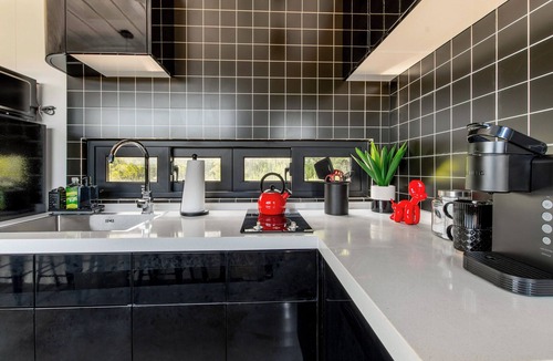 Littleton House | Container Home with Mountain Views Deck Fire Pit