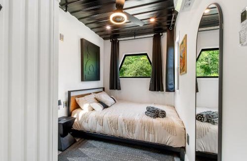 Littleton House | Container Home with Mountain Views Deck Fire Pit