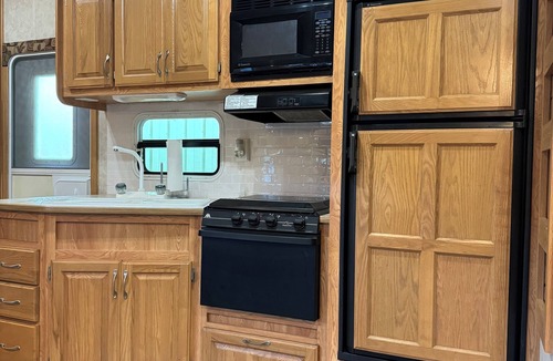 Schoharie RV Rental | Convenient Campsite W/fifth wheel camper, Creek Front.