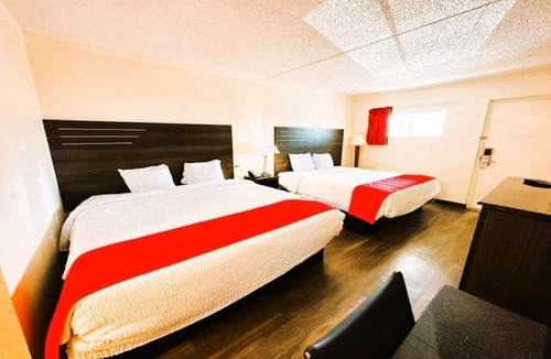West San Antonio Hotel | Convenient Room in San Antonio with 2 Queen Beds, Microwave, and Fridge!