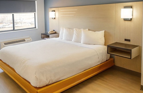 Van Buren Hotel | Convenient Room Located at Interstate 40 | Access to Downtown
