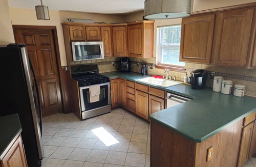 Seven Hills House | Convenient to airport, downtown, & parks.