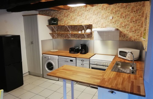 Bourbriac Cottage | Converted Breton stone barn with heated pool in lovely setting