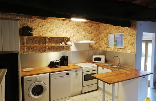Bourbriac Cottage | Converted Breton stone barn with heated pool in lovely setting