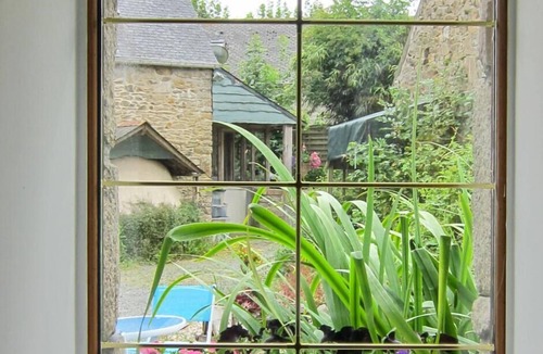 Bourbriac Cottage | Converted Breton stone barn with heated pool in lovely setting