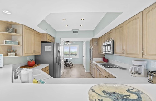 Crescent Beach Condo | Coral Reef Beach Resort by Panhandle Getaways