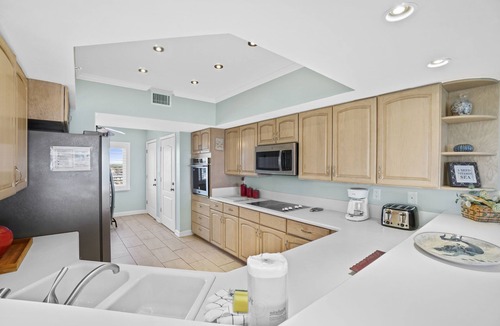 Crescent Beach Condo | Coral Reef Beach Resort by Panhandle Getaways