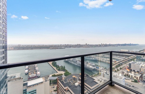 Hell's Kitchen Apartment | Corner 1BR Skyline and River Views Floor to Ceiling Windows Walk to Times Sq