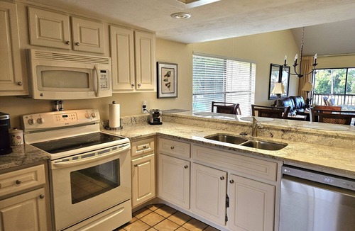 Biggar Condo | Corner condo with golf course views in The Forest