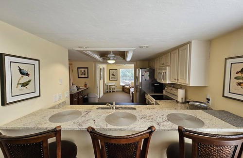 Biggar Condo | Corner condo with golf course views in The Forest