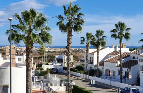 Villamartin Villa | Corner plot villa w/private pool, mini-golf & sea views. 5 min walk to Plaza!