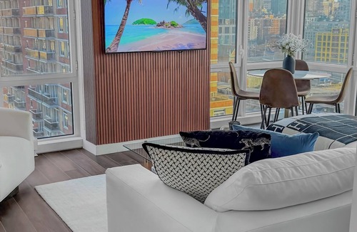 Hell's Kitchen Apartment | Corner Skyline Living 1BR with Floor to Ceiling Views Walk to Times Square