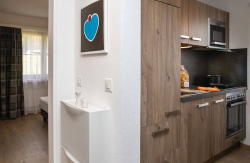 Falera Apartment | Cosy apartment for 4 guests with pool, WIFI, TV, balcony, pets allowed and panoramic view