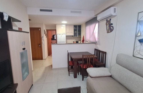 Plaza De La Costera Apartment | Cosy beach flat (ground floor) with terrace, AC, Heating and fast WiFi