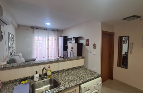 Plaza De La Costera Apartment | Cosy beach flat (ground floor) with terrace, AC, Heating and fast WiFi