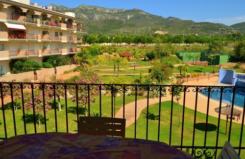 Sant Carles de la Rapita Apartment | Cosy apartment for 3 guests with pool, A/C, TV and balcony