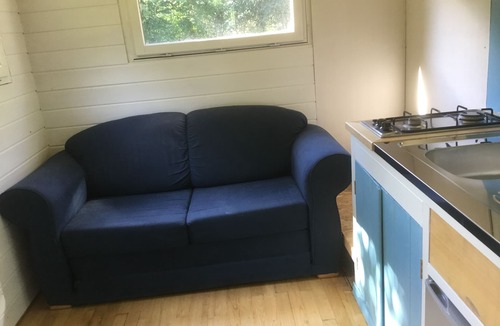 Saint-Vaury House | Cosy shepherds hut for two, with balcony, set alone in a hectare of land.