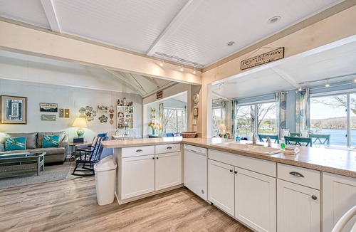 Moneta Cottage | Cottage at the Lake - Waterfront lake-view home with dock, fireplace, pool table, kayaks, & firepit