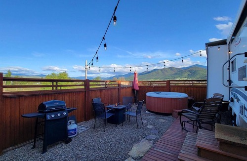 Talent House | Cottage features a queen-sized bed, dining area, and full kitchen.