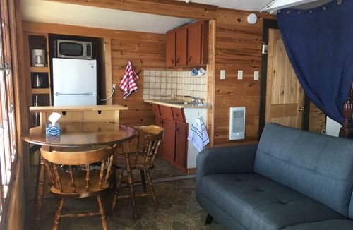 Minden House | Cottage on Horseshoe Lake, Minden, level lot, south facing, sandy beach