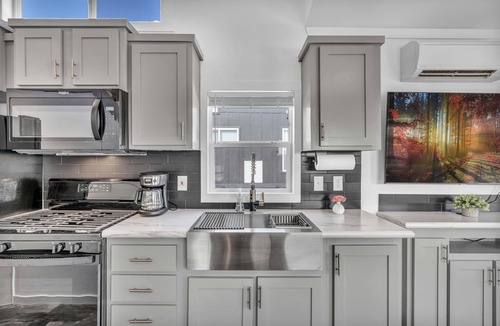 Brenham Cottage | Cottage with Bunk Beds - Includes 1 queen bed in the master, 2 bunk beds and 1 queen bed in the loft. A fully equipped kitchen, dining area, private bath and shower, TVs, Wifi, all utilities, access to all resort amenities. This cottage is pet friend