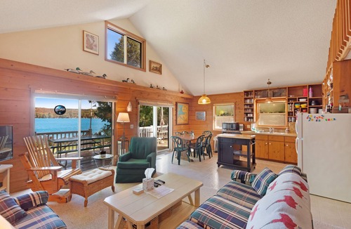 Boyne City House | Cottage with lake views, private dock & firepit - near public boat launch